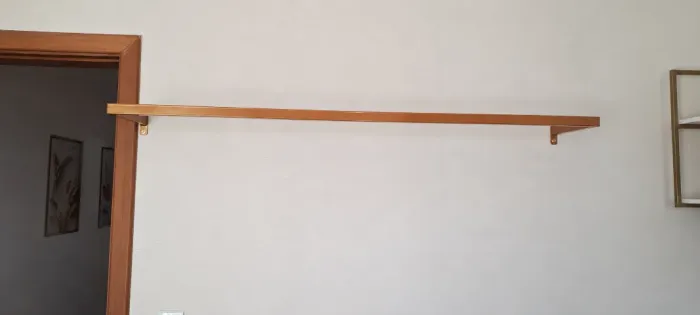 Arara para roupas de parede