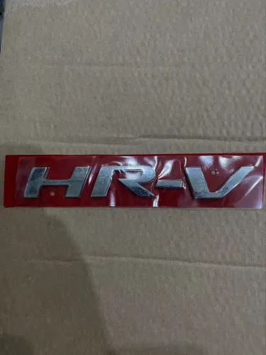 EMBLEMA SIGLA HR-V - TAMPA TRASEIRA