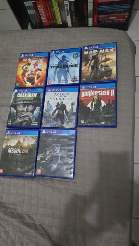 Vendo ps4 com 02 controles e 08 jogos