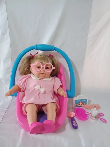 Neném dodói com bebê conforto canta,  fala e acende o dodói 