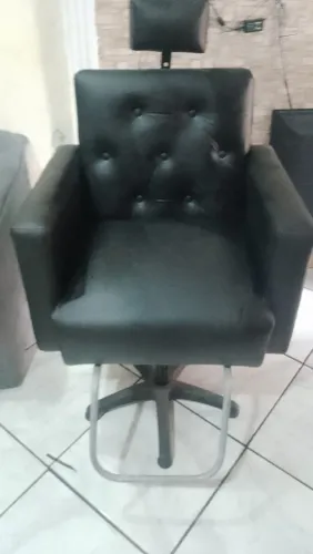 Cadeira de salão de beleza.