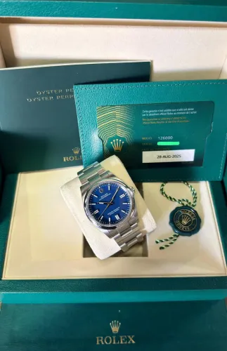 Rolex Oyster Perpetual Blue Dial ?Med Blue? Ref. 126000
