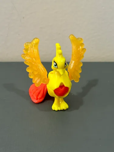 Kinder ovo pássaro amarelo. Fênix 