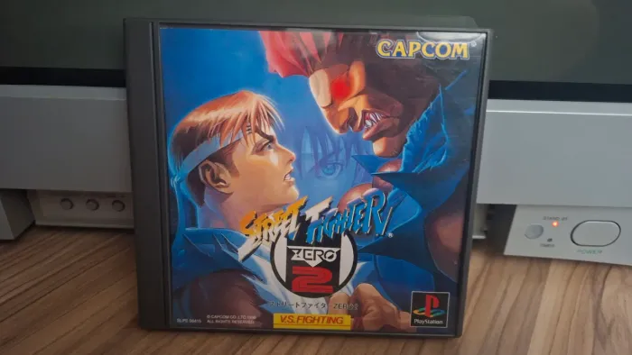 Street Fighter Zero 2 JP PS1 Leia Descrição 