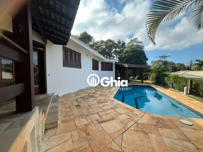 Casa com 4 dormitórios para alugar, 335 m² por R$ 12.657/mês - Condomínio Chácara Flora -