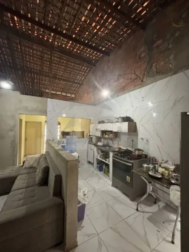 Casa de 210m² no Bairro Santos Dumont com 4 Quartos, 2 Suítes