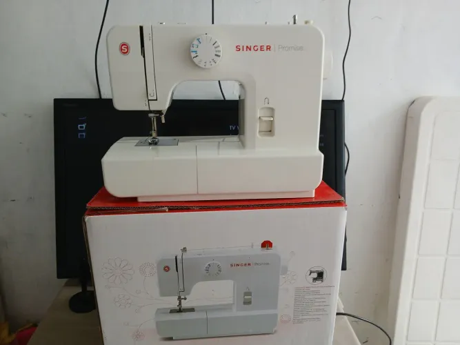 Máquina de costura singer