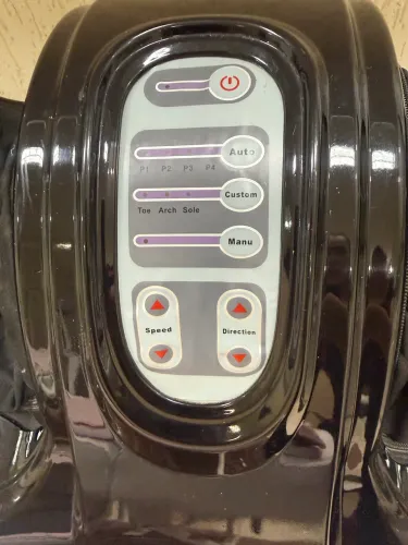 Aparelho massageador para os pés. 