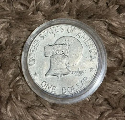 moeda de 1 dólar Eisenhower (Eisenhower Dollar).