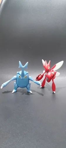 Pokemon battle figure scyzor e heracross