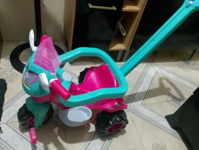 Triciclo menina