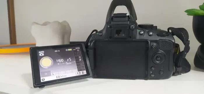 Nikon D5.100 perfeita aceito cartão