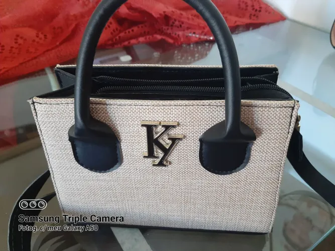 Bolsa social feminina nova.