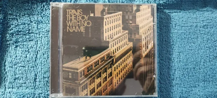 CD Travis - The Boy With No Name