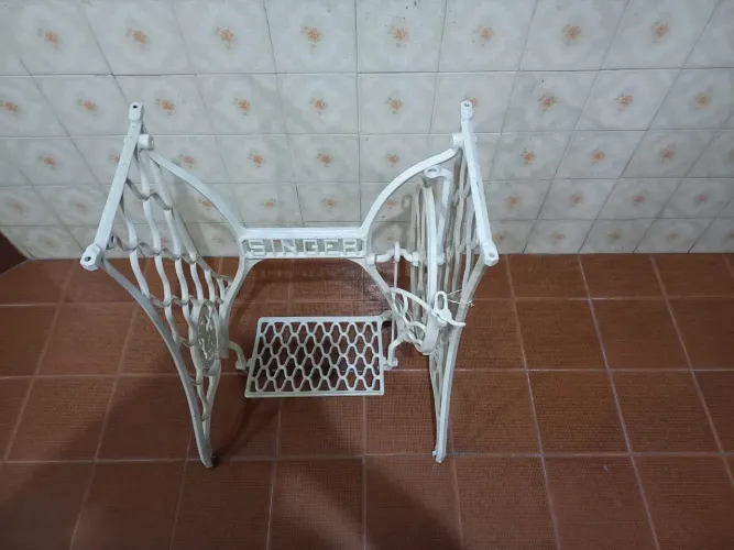 Pé de máquina de costura Singer Top