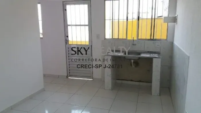 Terreno com 4 casas construidas - renda a venda