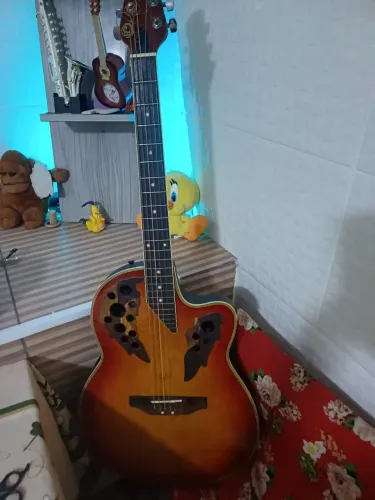 Troco violão ovation por uma guitarra ? 