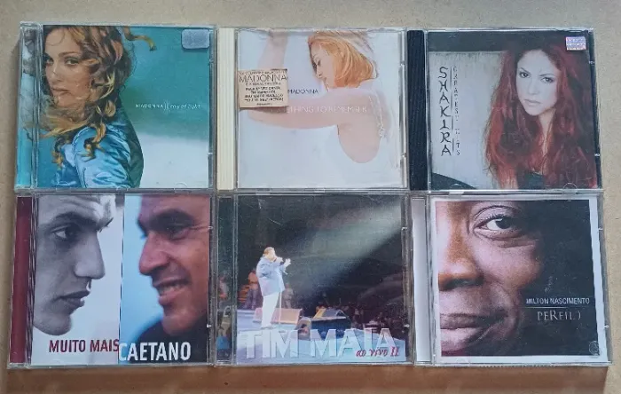 CDs Madonna Ray of Light, Remember, Shakira, MuitoMais Caetano, Tim Maia, Milton Nasciment