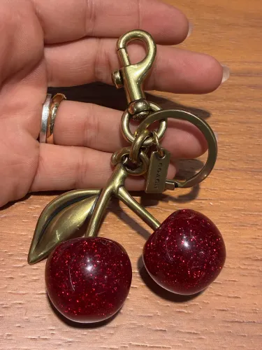 Chaveiro cherry  coach dourado original 