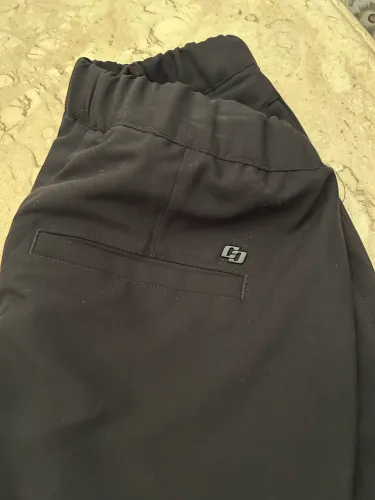 calça masculina preta da linha Colcci Tech