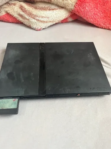 PlayStation 2 sem controle (Defeito no leitor)