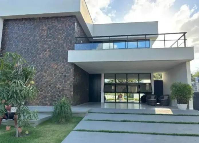 **VIVA O ALTO PADRÃO! Casa Espetacular em Condomínio Exclusivo Seu Sonho Realizado!**