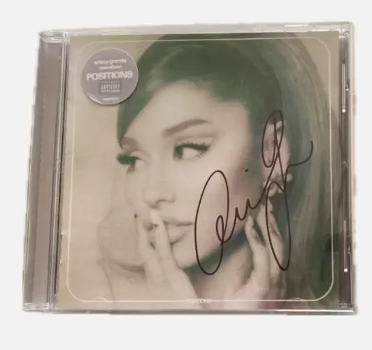 POSITIONS AUTOGRAFADO ARIANA GRANDE