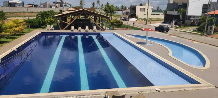 Lotes em Condomínio pé na areia.