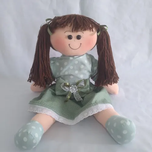 Boneca de pano presente