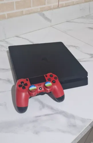 Ps4 slim 1TB controle original e mas de 100 jogos 