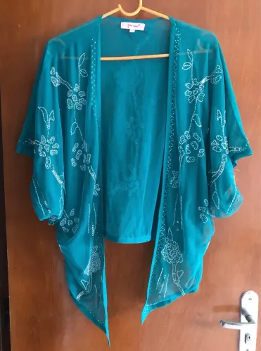Blusas com miçangas