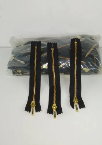 Zíper fixo metal dourado YKK 15cm c/100 unidades