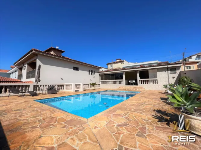 EXCELENTE CASA COM ÁREA DE LAZER COMPLETA EM SOCORRO/SP