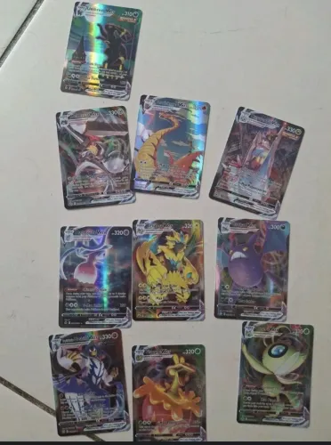 Kit com 50 cartinhas pokemkon brilhantes raras ( NÃO SÃO COPAG)