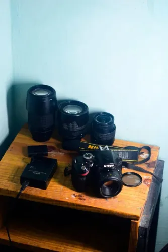 Camera Nikon  D3200 + 4 LENTES ? 