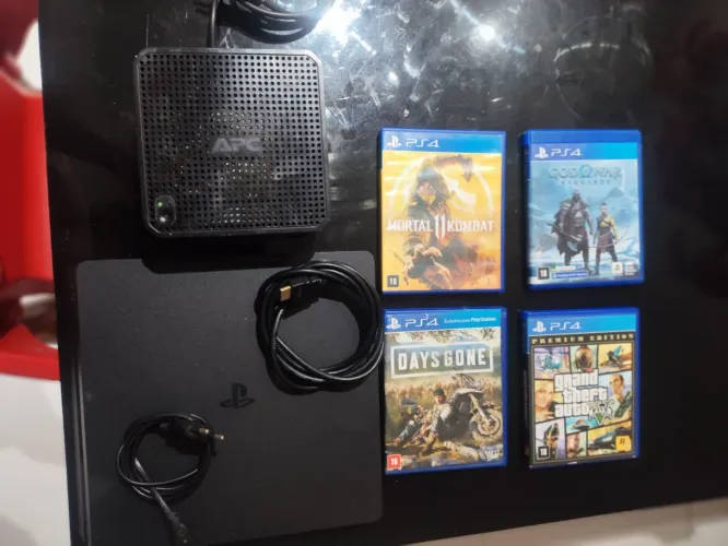 PS4 1T + 1 Controle, 1 estabilizador e 4 jogos