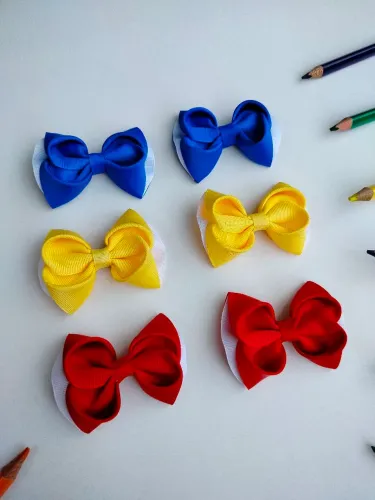 ?Lacinhos escolares ?