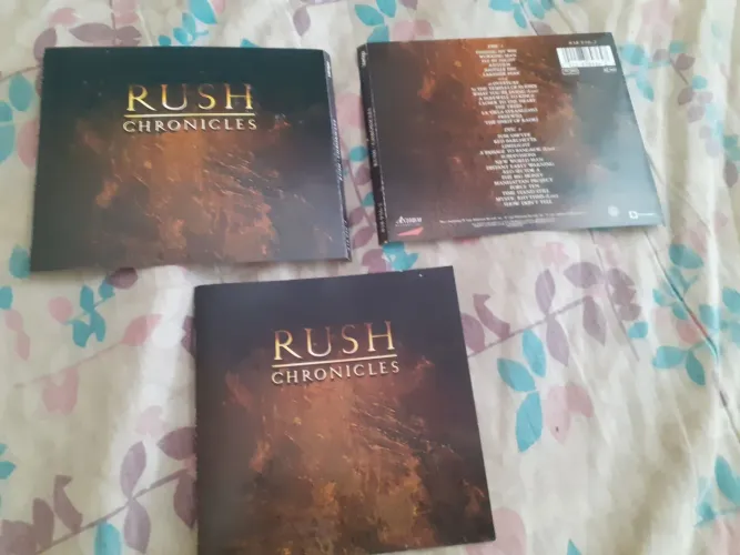 ENCARTE DO CD RUSH CHRONICLES LEIA O ANÚNCIO