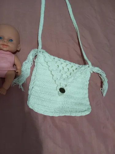 Boneca  e bolsa 