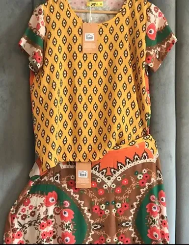 conjunto saia da marca joy 