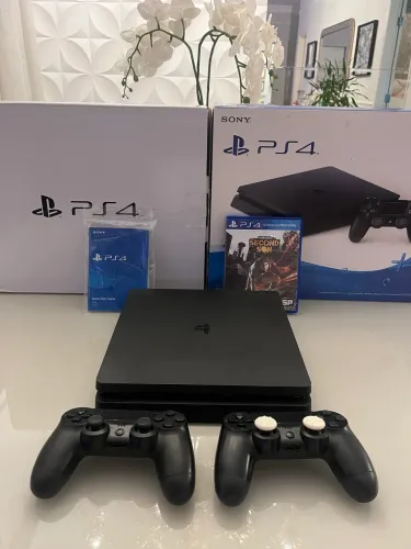 Ps4 slim IMPECÁVEL-acompanha caixa completa, manual lacrado ,controles, jogo e todos cabos