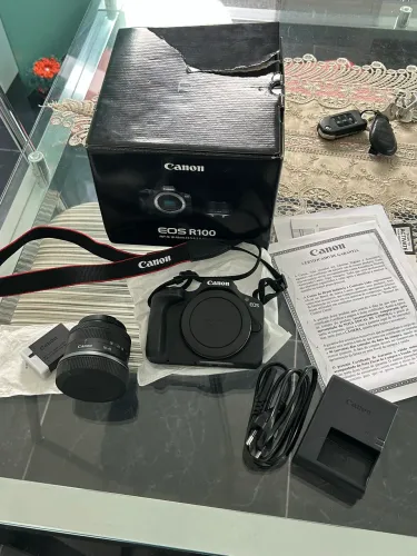 Canon EOS R100 Mirrorless - Estado de Nova