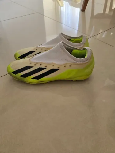 chuteira adidas X