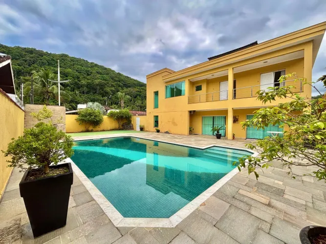 Casa em condomínio fechado à venda | QVista Inteligência Imobiliária Guarujá