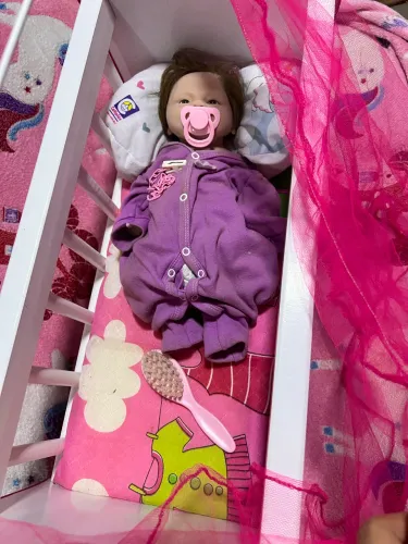 Kit boneca bebê Reborn + berço mosquiteiro colchão e chupeta 550,00 tudo