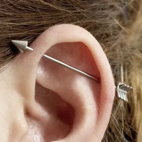 Piercing transversal industrial flecha
