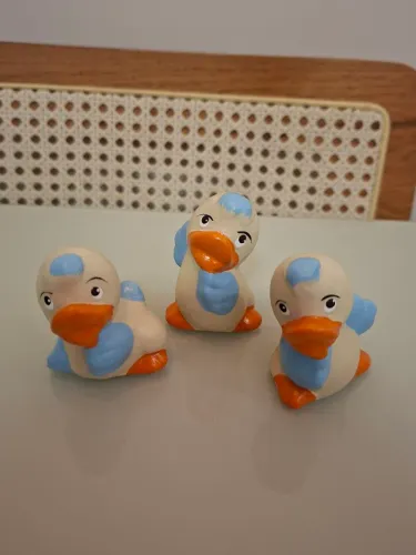 Trio em cerâmicas patinhos