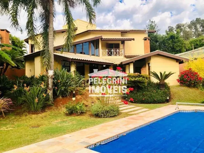 Casa com 4 dormitórios à venda, 408 m² por R$ 3.300.000,00 - Residencial Parque Rio das Pe