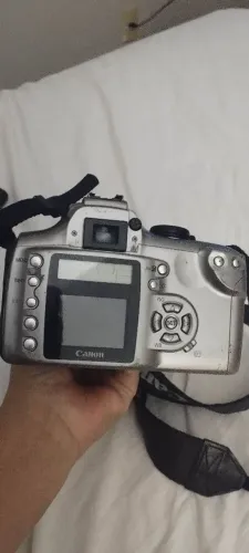 Máquina antiga Canon. Precisa comprar bateria, e conserto no compartimento do cartão