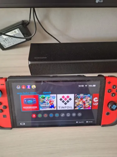 Nintendo switch oled desbloqueado + bolsa + cartão sd 256 gb